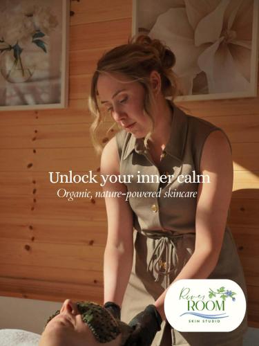 a woman giving a man a massage at Glenariff Forest Pine Cabin in Glenariff