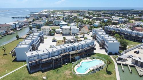 an aerial view of a resort by the water at Bay Tree B3 in Port Aransas