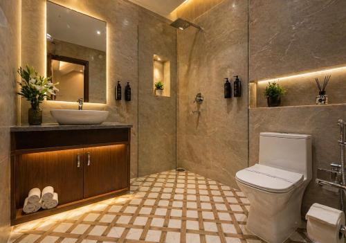 a bathroom with a toilet and a sink at Hotel Wilkisto By Amar Singh Near Taj Mahal in Agra