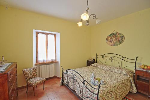 Katil atau katil-katil dalam bilik di Villa degli Artisti