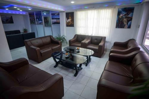 a living room with couches and a coffee table at OYO 789 Hotel Shivam Plaza in Kathmandu