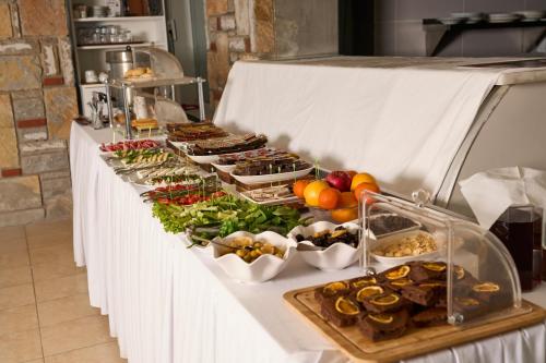 a buffet line with many different types of food at Mia Hill Suites in Bodrum City