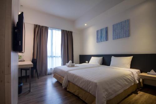 Cama o camas de una habitación en Fuller Hotel Kulim