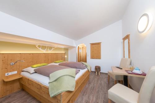 Katil atau katil-katil dalam bilik di Comfort Hotel Garni Landhaus Gitti