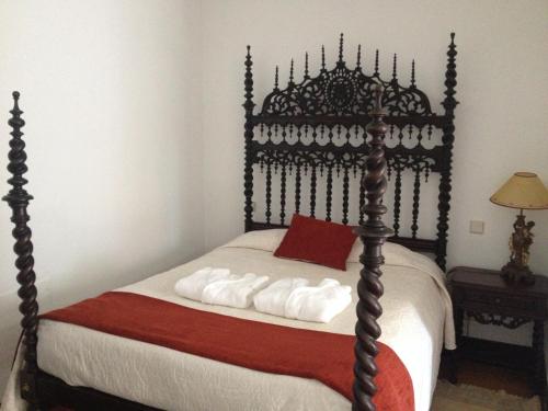 מיטה או מיטות בחדר ב-Quinta de Malta