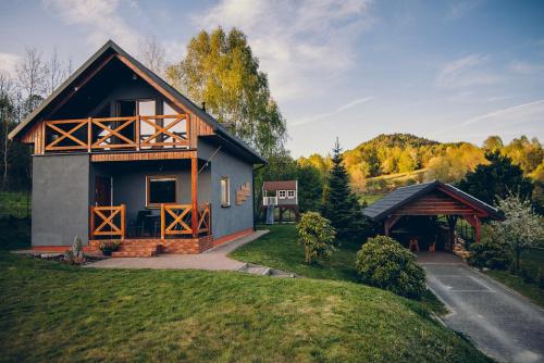 a house on a hill with a gazebo at Zacisze Krzeszów in Krzeszów