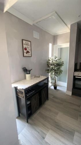 a kitchen with a island in a room at Sea breeze house in Dog Island