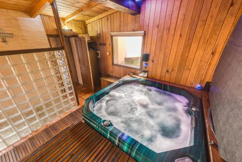 an overhead view of a bath tub in a room at Los Montejos & Spa in Valverde del Fresno