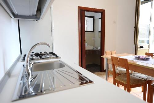 Kuchyň nebo kuchyňský kout v ubytování Casa Vacanze Mamarose