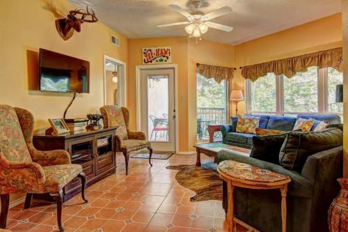 a living room with a couch and chairs at IC 110 Comal Corral in New Braunfels