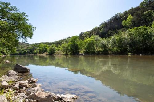 a view of a river with trees in the background at RG 306 Hillside River Retreat in Canyon Lake
