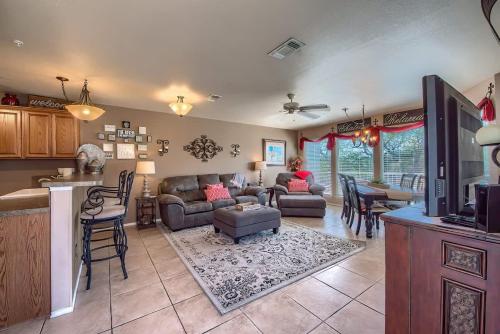 a kitchen and living room with a couch and a table at WW D302 Chateau Relaxeau in New Braunfels