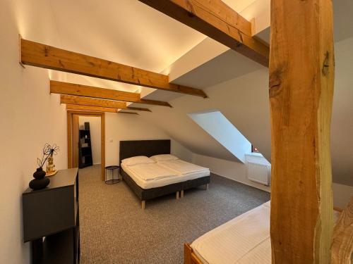 Llit o llits en una habitació de Sruby Haida