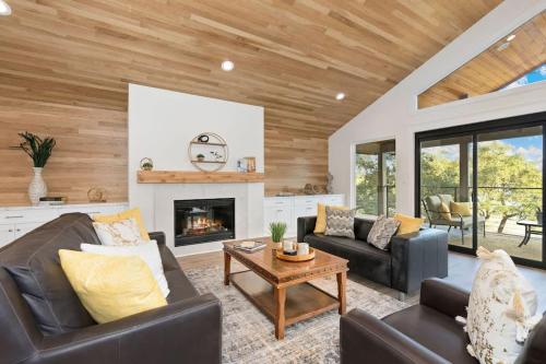 a living room with couches and a fireplace at CL 874 Million Dollar View in Canyon Lake