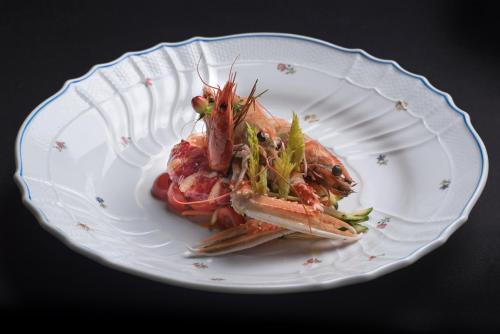 a plate of food with crabs on it at Villa Margherita in Mira
