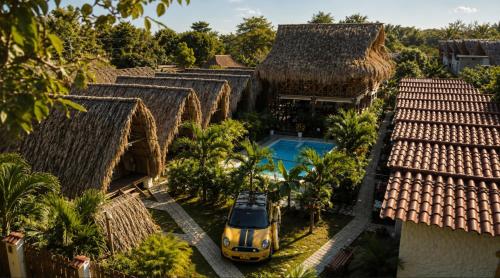 an aerial view of a house with a car parked in the yard at Palomino Sunrise in Palomino