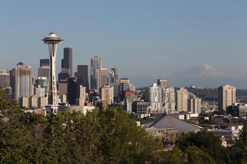 a view of a city with the space needle at Hotel Theodore in Seattle