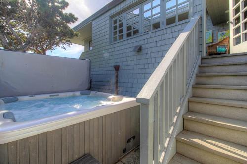 a hot tub on the side of a house at Harbour House in Bodega Bay