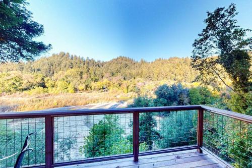 a balcony with a view of a forest at Villa Eileen in Guerneville