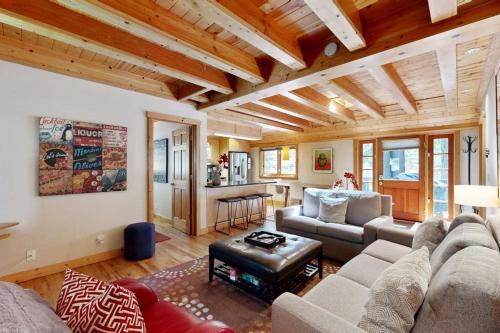 a living room with a couch and a table at Monte Rio Dream in Monte Rio