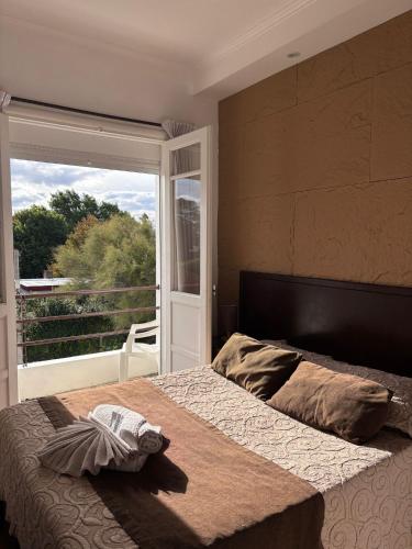 Una cama o camas en una habitación de Hotel Select