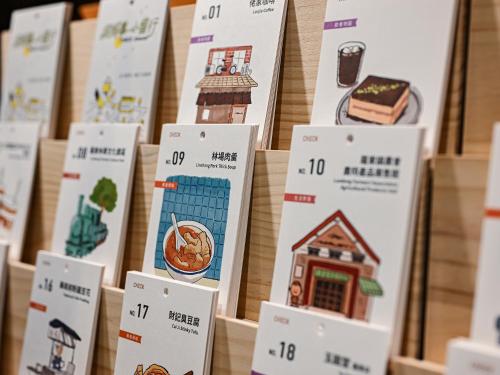 a display of gingerbread houses for sale at a store at CHECK inn HIVE in Luodong