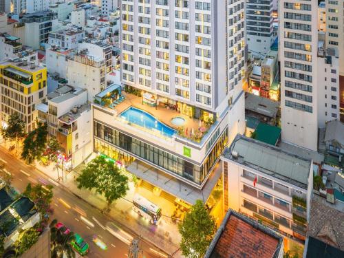 an overhead view of a city street with buildings at ibis Styles Nha Trang in Nha Trang