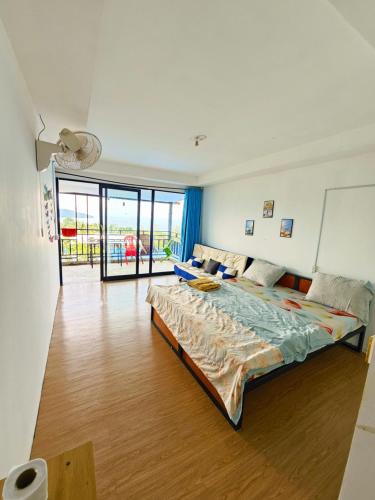 a bedroom with a large bed in a room at Top Views Retreat in Koh Rong Island