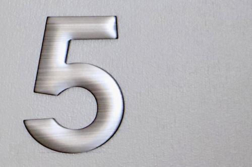 a silver number is shown on a wall at Sable Shores in Batemans Bay