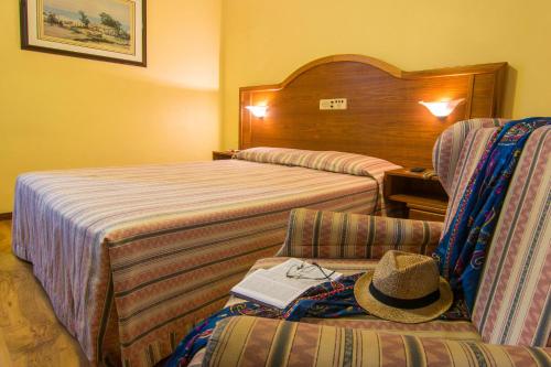Hotel Sky Gramadoにあるベッド