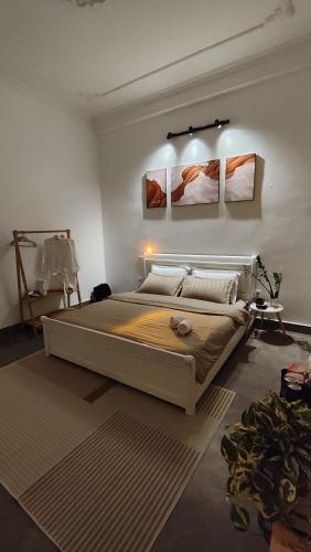 a bedroom with a large bed in a room at Behomestay in Hai Phong