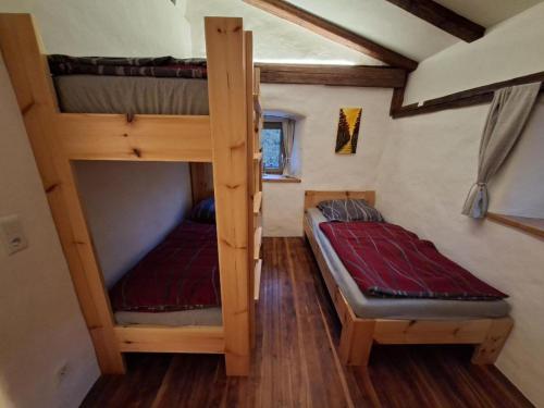 a bedroom with two bunk beds in a room at Ferienhaus Wittmann in Beilngries