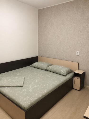 a bed in a small room with at Casa Elena in Constanţa