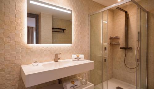 Koupelna v ubytování Hotel Las Dunas