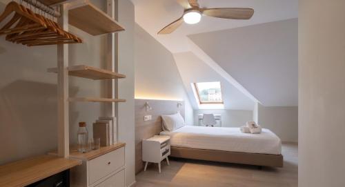 Postel nebo postele na pokoji v ubytování Hotel Las Dunas