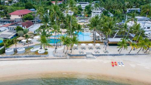 an aerial view of the beach at the resort at OUTRIGGER Koh Samui Beach Resort in Lamai
