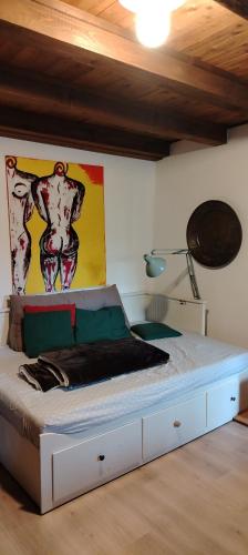 Tempat tidur dalam kamar di Cenedam