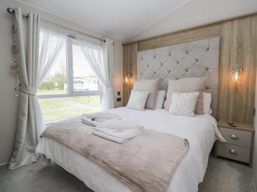 Llit o llits en una habitació de Swan Haven