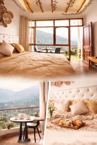 a bedroom with a bed and a table and a view at Siesta B&B Private Balcony & Himalayan Sunrise Views in Shimla