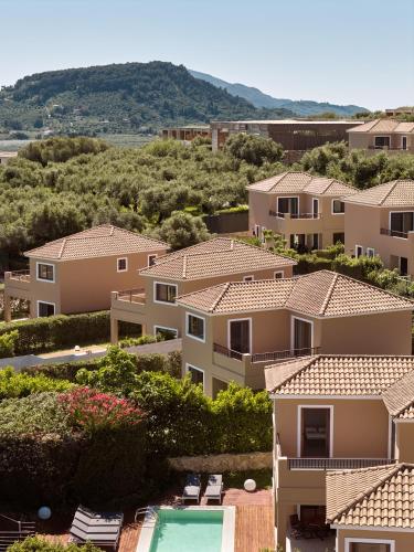 arial view of a row of apartment buildings at St John Villas Zakynthos in Tsilivi