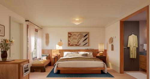 a bedroom with a large bed in a room at Oyster Estate in Greenport