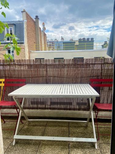 Appartement avec terrasse fleurie au dernier étage - Paris 17