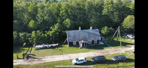an aerial view of a house with a solar roof at Metsatoa in Alliklepa