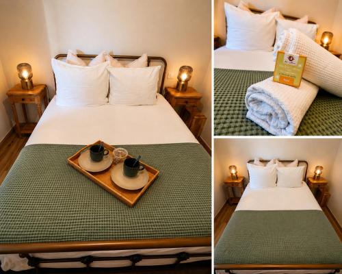 a hotel room with a bed with a tray of coffee cups at Maisonnette de charme A 5 min du Parc PUYDUFOU in Les Épesses