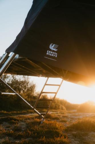 a close up of the back of a chair in a field at K-Tent 1 in Treknow