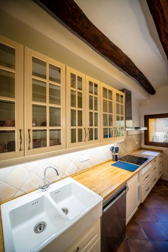 a kitchen with a sink and a counter top at Ca L'Avi in Ca l’Avi