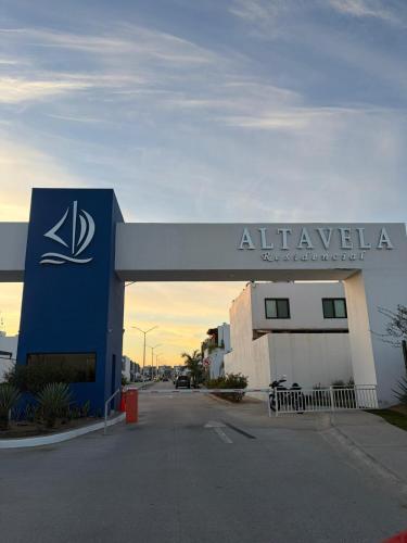 a sign for an alleela gas station at Casa moderna, 3 recámaras, alberca, La Paz BCS in La Paz