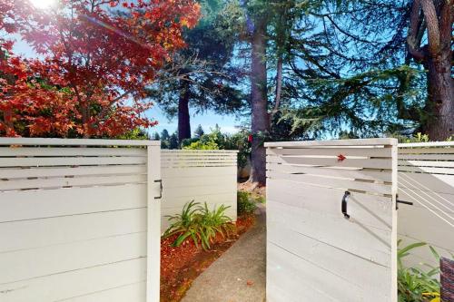 a white fence with trees in the background at Silverado Resort and Spa 354 in Napa