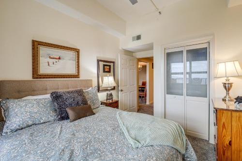 a bedroom with a bed and a desk and a window at Pool Access! Ski-In/Out Sugar Mtn Gem w/ Views in Sugar Mountain