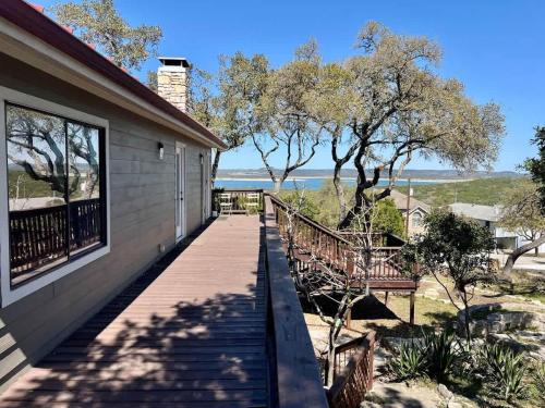 a porch of a house with a view of the water at Canyon Lake House with Lake View in Canyon Lake